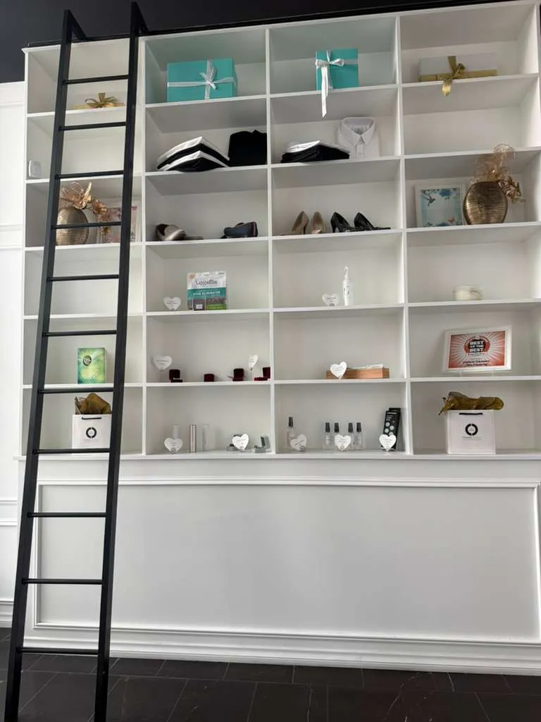 Central Cleaners display wall with garment-care products and accessories