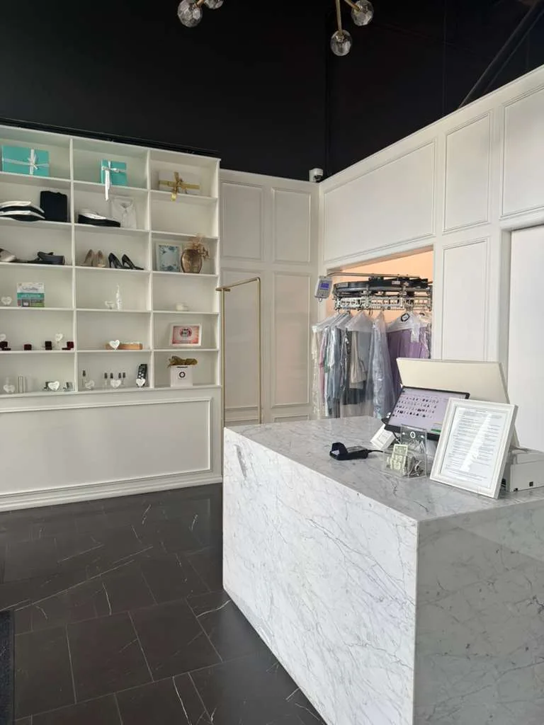 Central Cleaners reception counter and finished garment area in St. Petersburg